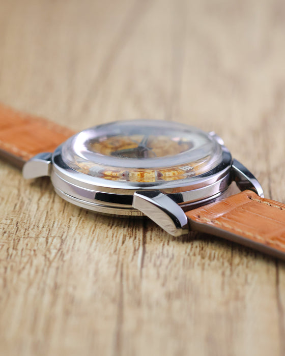 Angled side view of the Omega Seamaster Calendar Ref. 2849 with its polished lugs and high domed crystal.