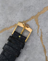 Original signed Corum gold-plated buckle with key motif.