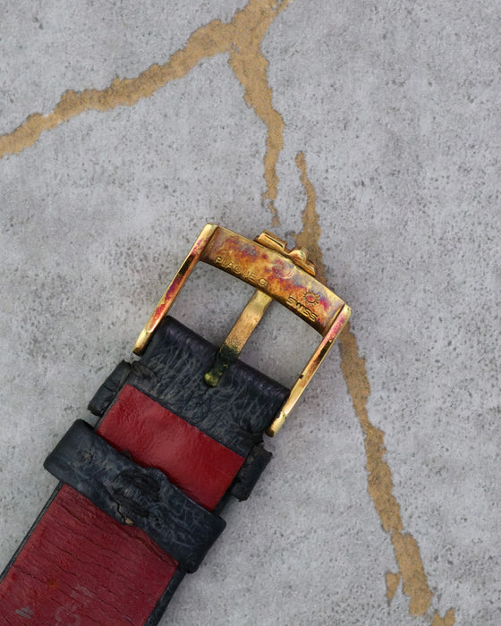 Reverse of the original signed Corum buckle.