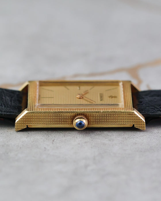 Front profile showing the slim rectangular case.