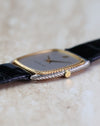 Side profile of the Audemars Piguet 4157CA showing its yellow and white gold rope case.
