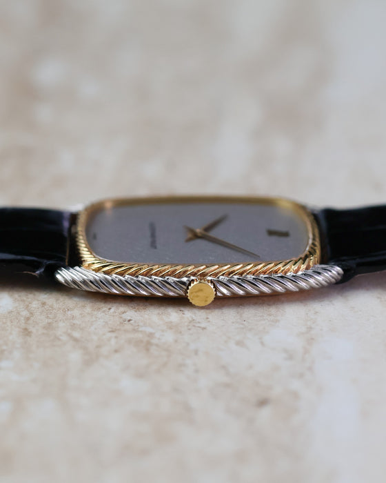 Crown-side view of the Audemars Piguet 4157CA highlighting the twisted two-tone rope construction.