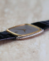 Close-up of the yellow gold inner rope bezel and contrasting white gold outer case.