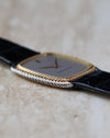 Angled side view showing the slim profile and two-tone rope finishing of the Audemars Piguet 4157CA.