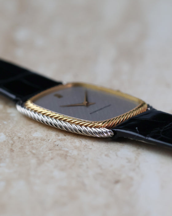 Angled side view showing the slim profile and two-tone rope finishing of the Audemars Piguet 4157CA.