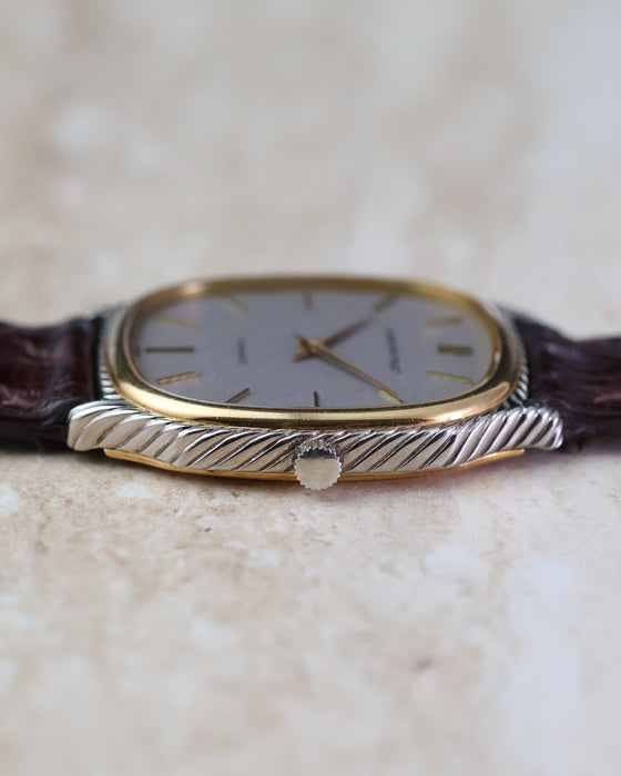 Crown-side profile highlighting the contrasting yellow and white gold construction of the Audemars Piguet rope case.