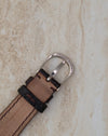 Reverse of the signed Audemars Piguet 18K gold buckle and leather strap.