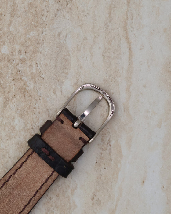 Reverse of the signed Audemars Piguet 18K gold buckle and leather strap.