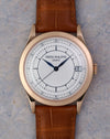 Front view of the Patek Philippe Calatrava 5296R-001 with two-tone silver sector dial and blued hands.