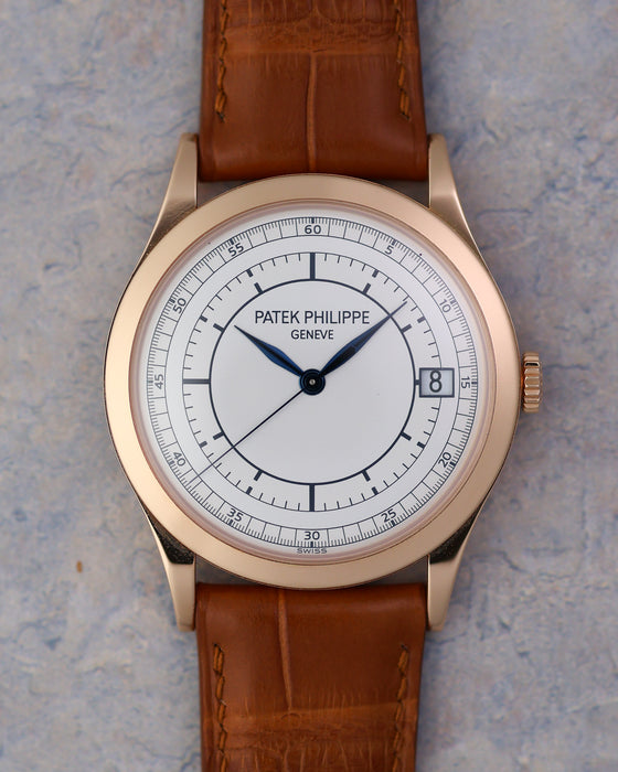 Front view of the Patek Philippe Calatrava 5296R-001 with two-tone silver sector dial and blued hands.
