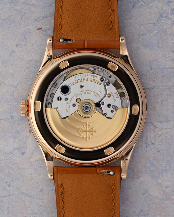 Patek Philippe Calatrava 5296R-001 sapphire caseback with gold rotor and automatic movement.