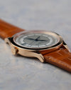 Side profile of the Patek Philippe Calatrava 5296R-001 showing its polished rose gold case and domed crystal.