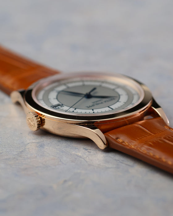 Side profile of the Patek Philippe Calatrava 5296R-001 showing its polished rose gold case and domed crystal.