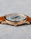 Crown-side profile showing the curved Calatrava case, lugs and signed Patek Philippe crown.