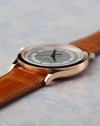 Angled case view showing the slim profile and polished rose gold finishing.