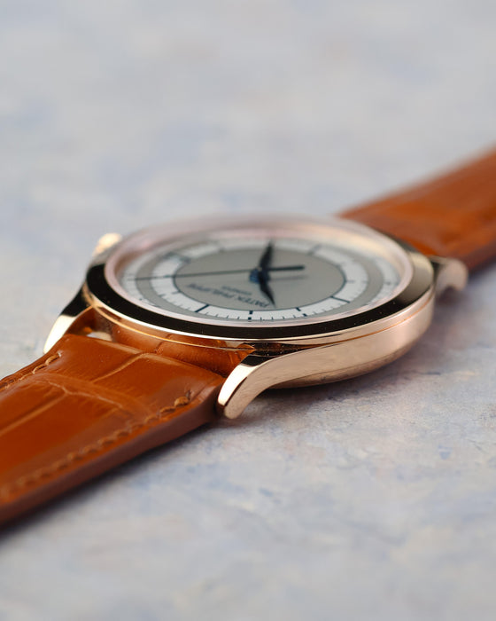 Angled case view showing the slim profile and polished rose gold finishing.