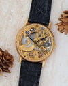 Universal Genève skeleton watch in 18K yellow gold with engraved openworked movement.