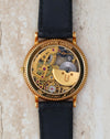 Exhibition caseback revealing the automatic micro-rotor movement and engraved Universal Genève details.