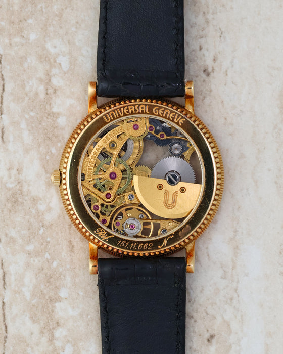 Exhibition caseback revealing the automatic micro-rotor movement and engraved Universal Genève details.