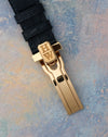 Harry Winston signed 18K gold deployant buckle fitted to the black leather strap.