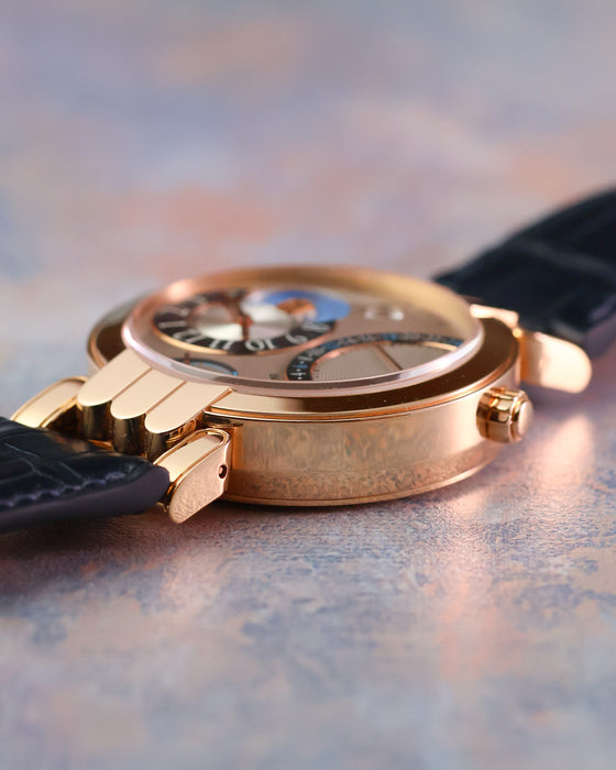 Side view highlighting the case construction and articulated lug design of the Premier Excenter Time Zone.