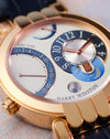 Macro view of the asymmetric dial showing the retrograde 24-hour time zone, local time, day/night display, date and power reserve.