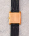 Caseback of the 18K yellow gold Piaget Protocole Ref. 9154 on its original black strap.