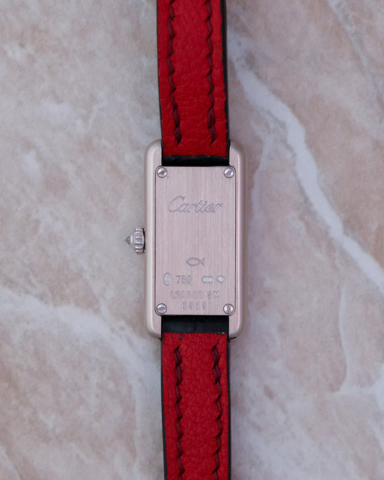 Caseback of the Cartier Tank Allongée Ref. 2525 in 18K white gold with Cartier hallmarks and engravings.