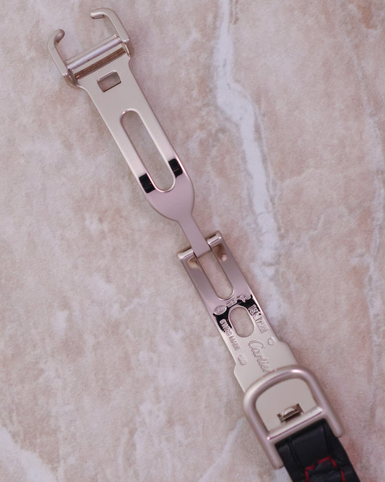 Cartier 18K white gold deployant buckle accompanying the Tank Allongée.