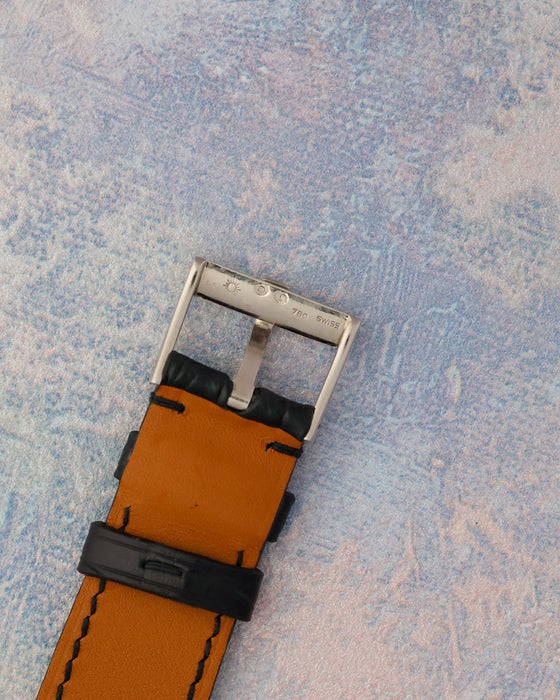Reverse view of the signed Piaget 18K white gold pin buckle marked 750.