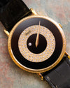 Close-up of the Piaget 9026 dial with black onyx, pavé-set diamond ring, mystery-hour diamond and gold minute hand.