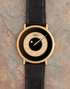 Front view of the Piaget Ref. 9026 in yellow gold with black onyx and diamond-set mystery-hour dial.