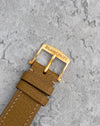 Signed Blancpain yellow-gold pin buckle fitted to the brown leather strap.