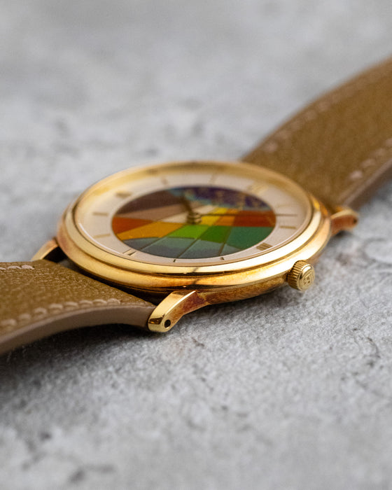 Side profile of the Blancpain Ref. 0021 showing its slim stepped yellow-gold case and cloisonné enamel dial.