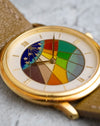 Macro view of the Blancpain cloisonné enamel dial showing its geometric enamel sections, fine metal partitions and applied gold stars.
