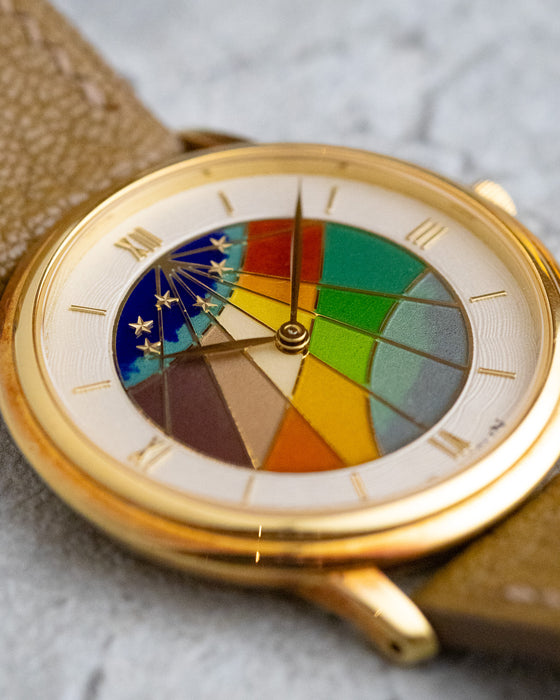 Macro view of the Blancpain cloisonné enamel dial showing its geometric enamel sections, fine metal partitions and applied gold stars.
