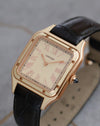 Angled view of the Cartier Santos-Dumont WGSA0054 showing its rose-gold case, lacquer detailing and sapphire-set crown.