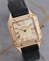 Close angled view of the Cartier Santos-Dumont WGSA0054 highlighting its applied Roman numerals and concentric square dial pattern.