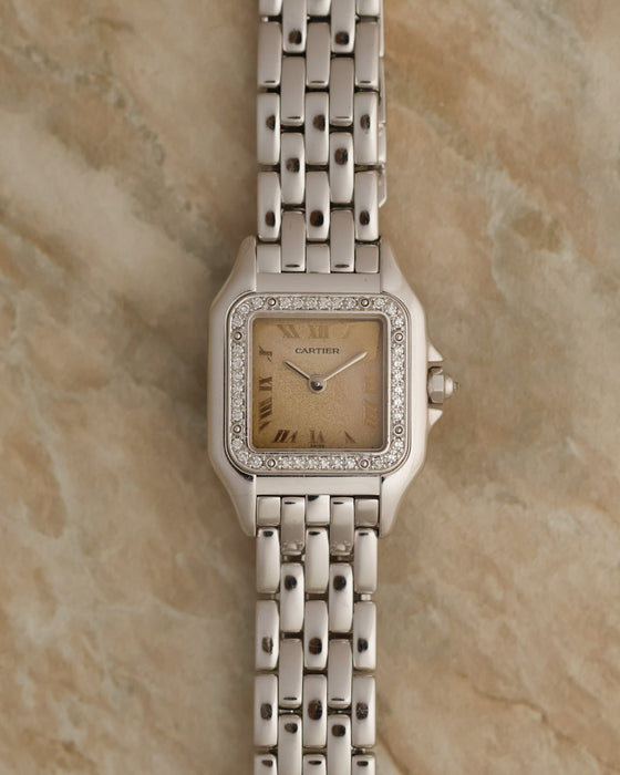 Front view of the Cartier Panthère Ref. 1660 with aged silvered dial, factory diamond bezel and white-gold bracelet.