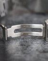 Interior of the stainless-steel Audemars Piguet deployant clasp showing its stamped markings.