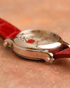 Side view of the Chopard Happy Sport highlighting the polished case construction and floating dial elements beneath the crystal.