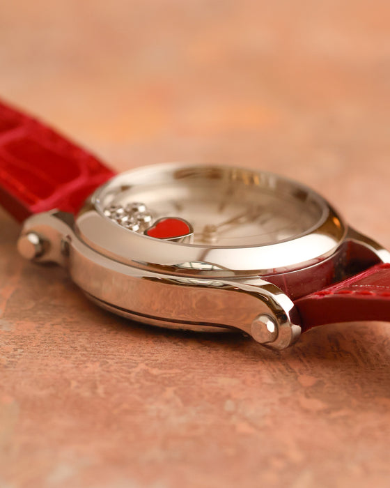 Side view of the Chopard Happy Sport highlighting the polished case construction and floating dial elements beneath the crystal.