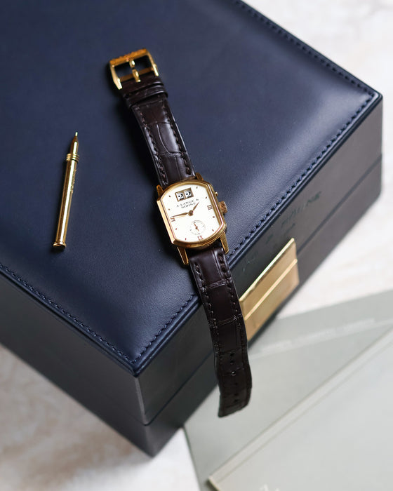 A. Lange & Söhne Arkade Ref. 103.021 in yellow gold displayed with its presentation box, papers and setting stylus.