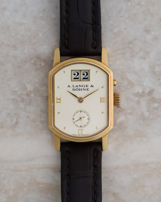 Front view of the A. Lange & Söhne Arkade 103.021 showing its ivory dial, outsize date and small seconds.