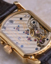 Macro view through the sapphire caseback showing the decorated calibre L911.4 and hand-engraved balance cock.