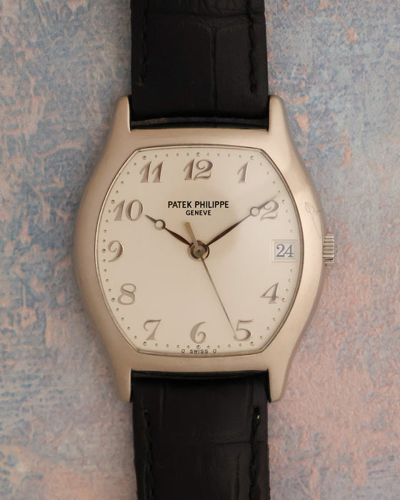 Patek Philippe Gondolo Ref. 5030G in 18K white gold with silver dial and black leather strap.
