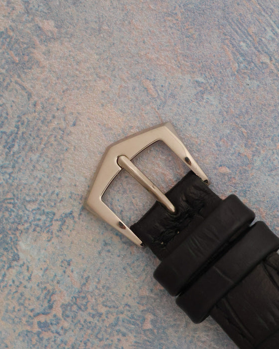 Close-up of the black leather strap and white-gold pin buckle of the Patek Philippe Gondolo 5030G.