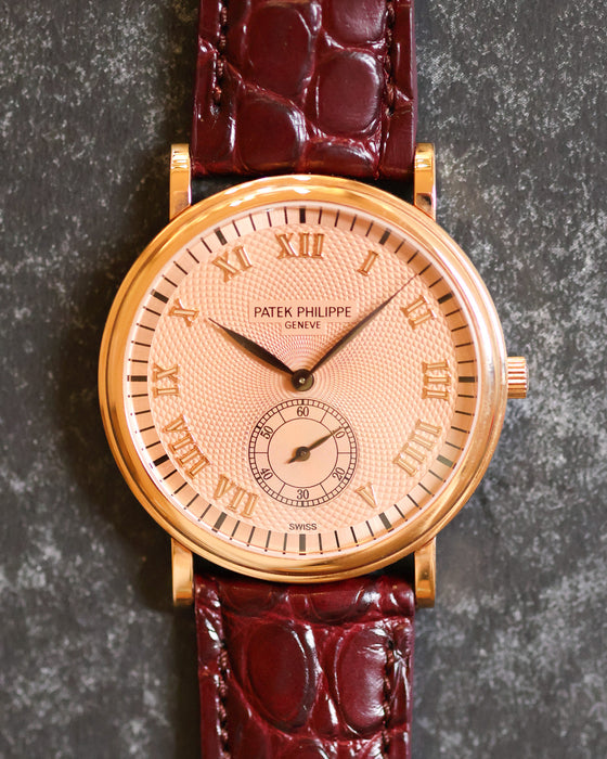 Front view of the Patek Philippe Calatrava 5022R with pink guilloché dial and subsidiary seconds at 6.
