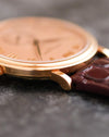 Side profile showing the slim case and straight rose-gold lugs of the Patek Philippe Calatrava 5022R.
