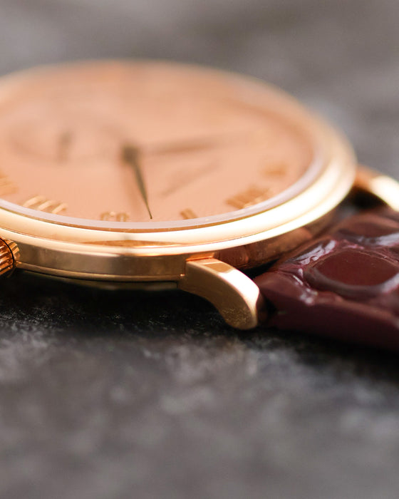 Side profile showing the slim case and straight rose-gold lugs of the Patek Philippe Calatrava 5022R.